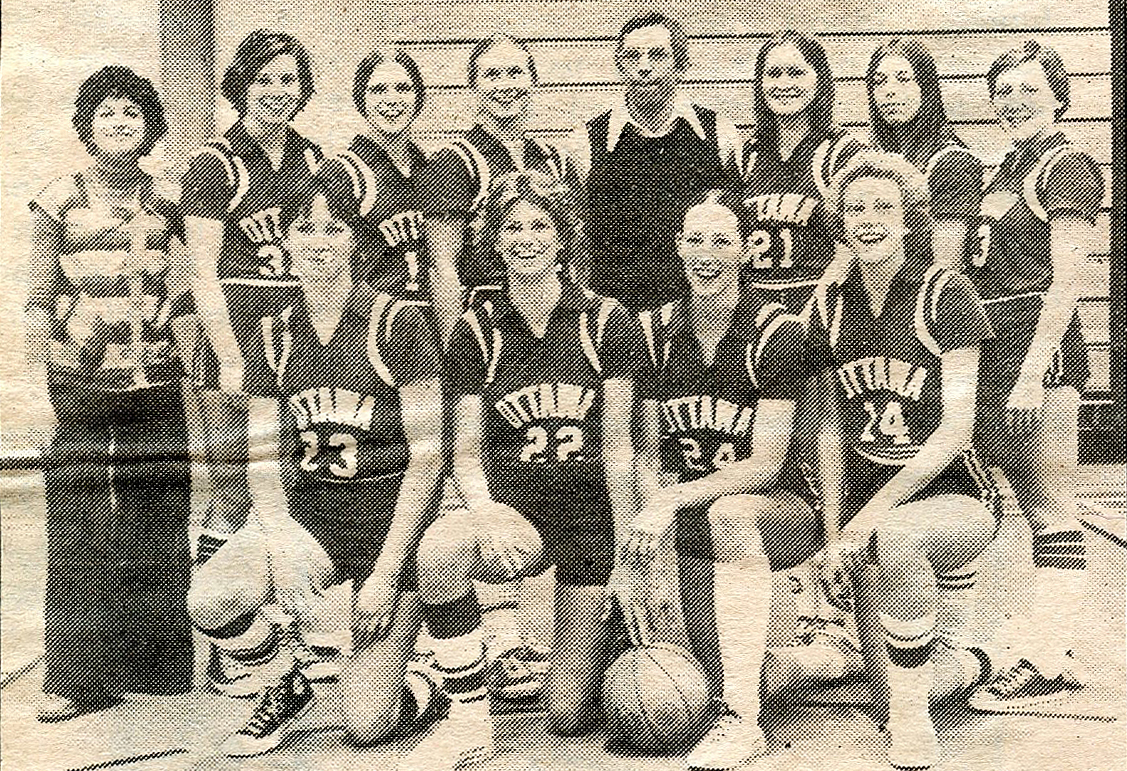 Newspaper clipping of women's basketball team.