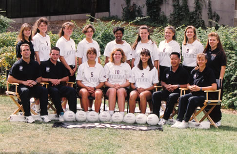 Women's volleyball team photo, outdoors, 1994-95.