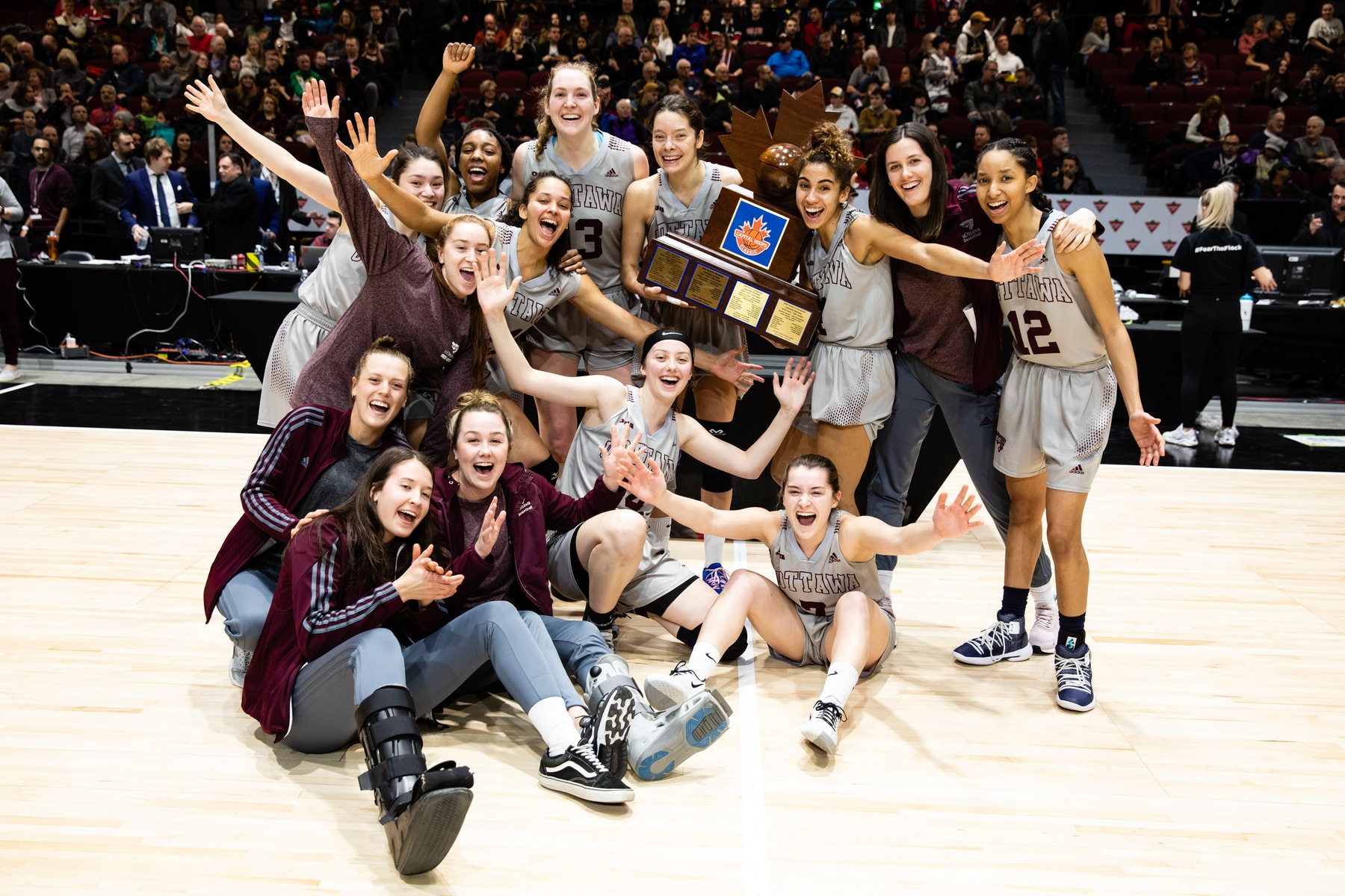 Gee-Gees women's team 2020 celebrates with trophy