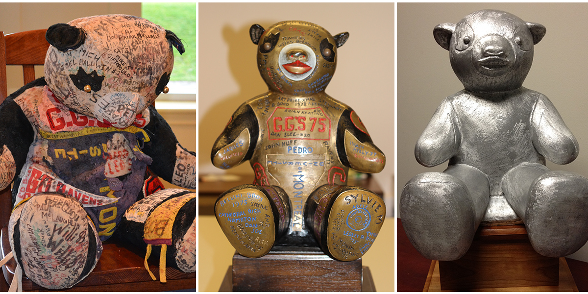 The three versions of Pedro the Panda, from left to right: the original stuffed bear, the bronze bear trophy, the new aluminum version.