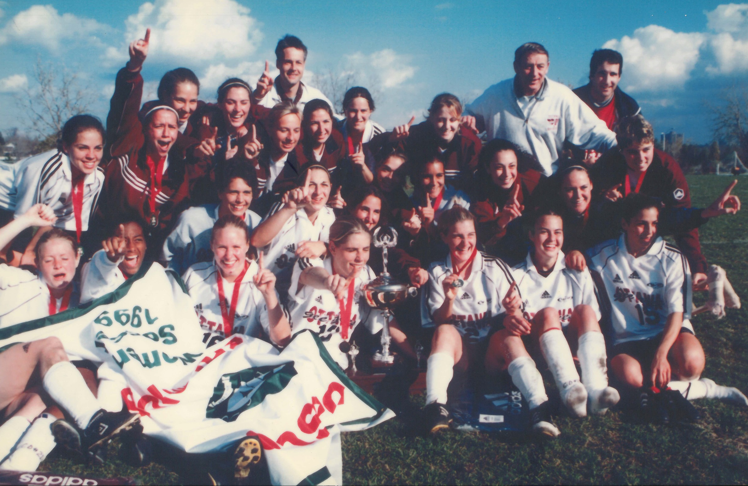 1999 Gee-Gees soccer team celebrates their OUA championship