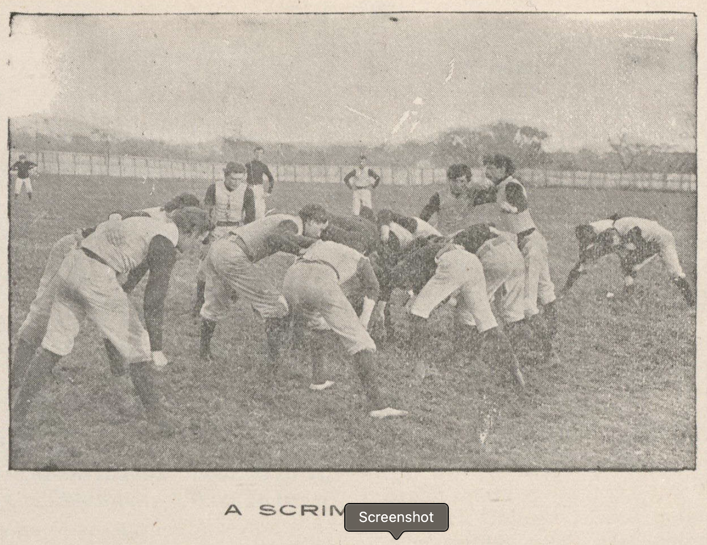 A group of football players in uniform on the field, playing football. Text below reads "A scrimmage."